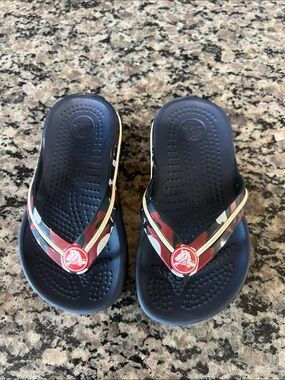 CROCS Navy Blue Flip Sandals with Red Logo